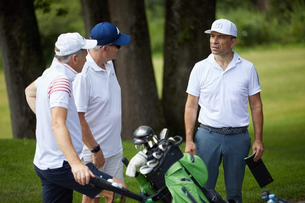 3 Golfspieler auf dem Golfplatz